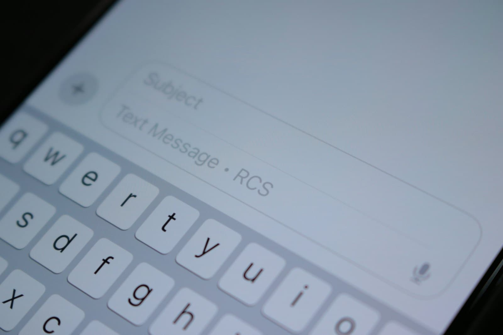 A phone screen with a message being written.